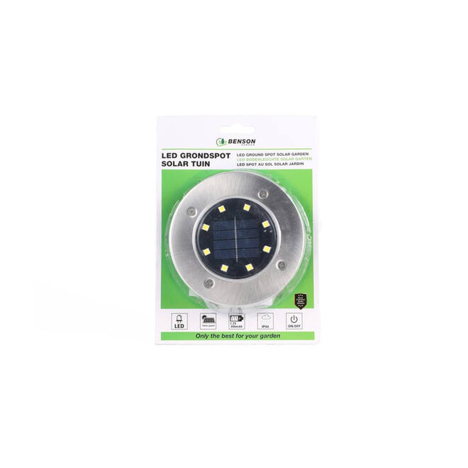 Verkaufsverpackung der LED-Solarlampe mit Sichtfenster. Zu sehen ist die Lampe mit acht LEDs und Solarpanel. Die Verpackung trägt die Aufschrift „LED GRONDSPOT SOLAR TUIN“ und Symbole zu LED, Solarbetrieb und Schalter.
