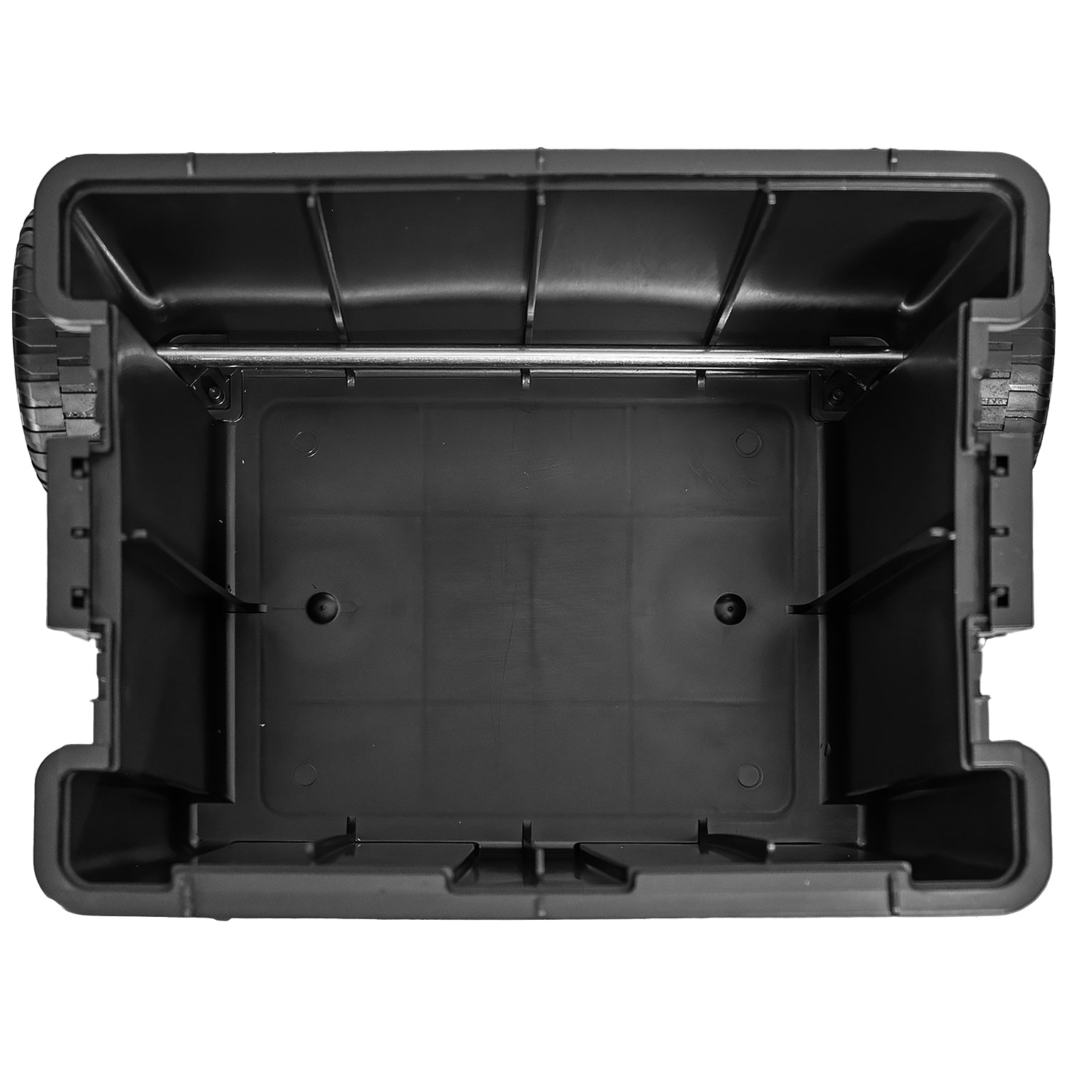 Innenansicht des unteren Rollfachs des Werkzeugkastens in Schwarz mit sichtbaren Verstärkungsrippen und Achse der Räder.