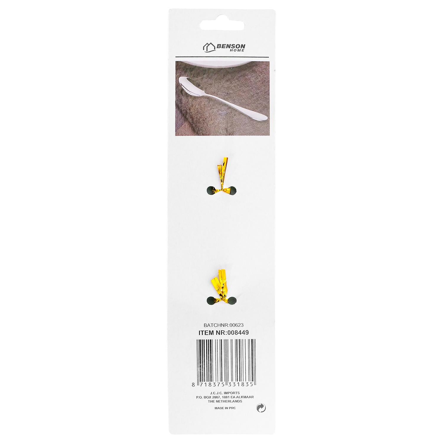 Rückseite der schmalen Verkaufsverpackung in Weiß mit kleinem Produktfoto eines Esslöffels, zwei goldfarbenen Befestigungsdrähten, Barcode sowie Artikel- und Batchnummer, freigestellt vor weißem Hintergrund.